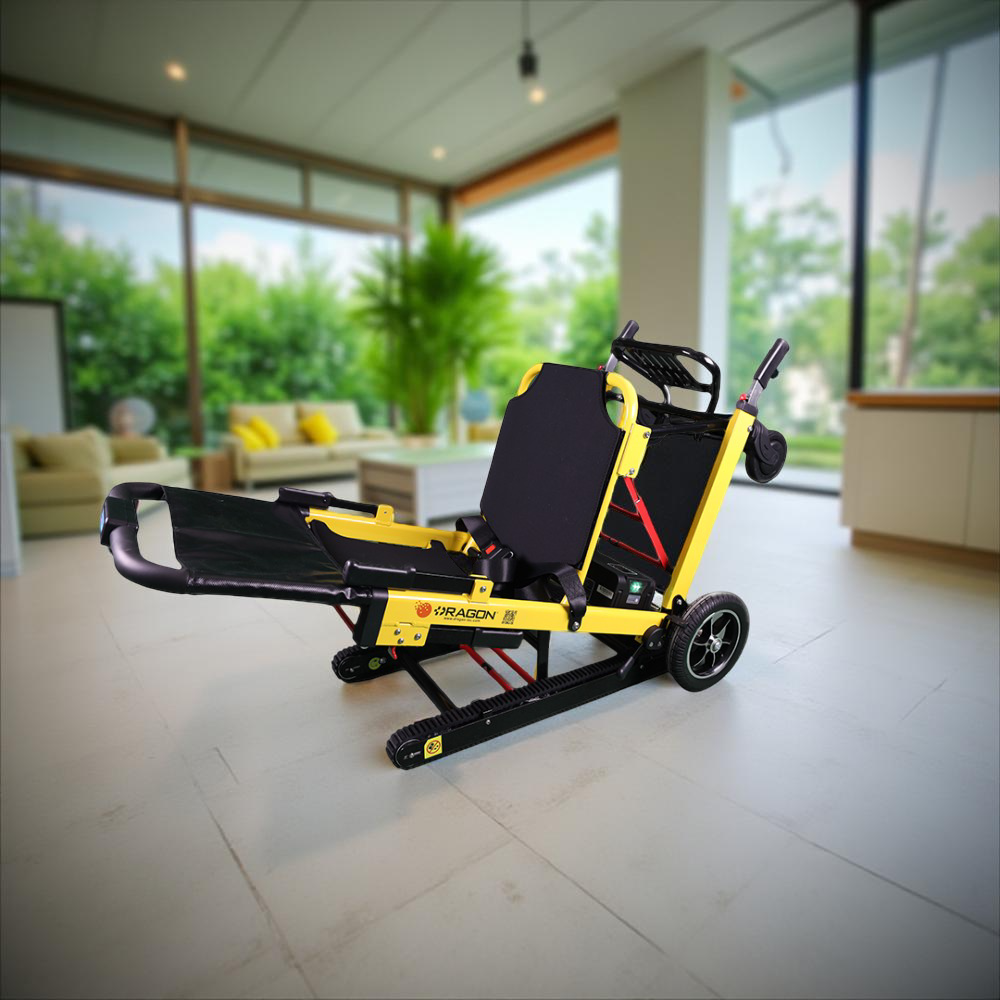 A yellow emergency lift stretcher with wheels, positioned in a bright indoor setting featuring large windows and modern furniture.